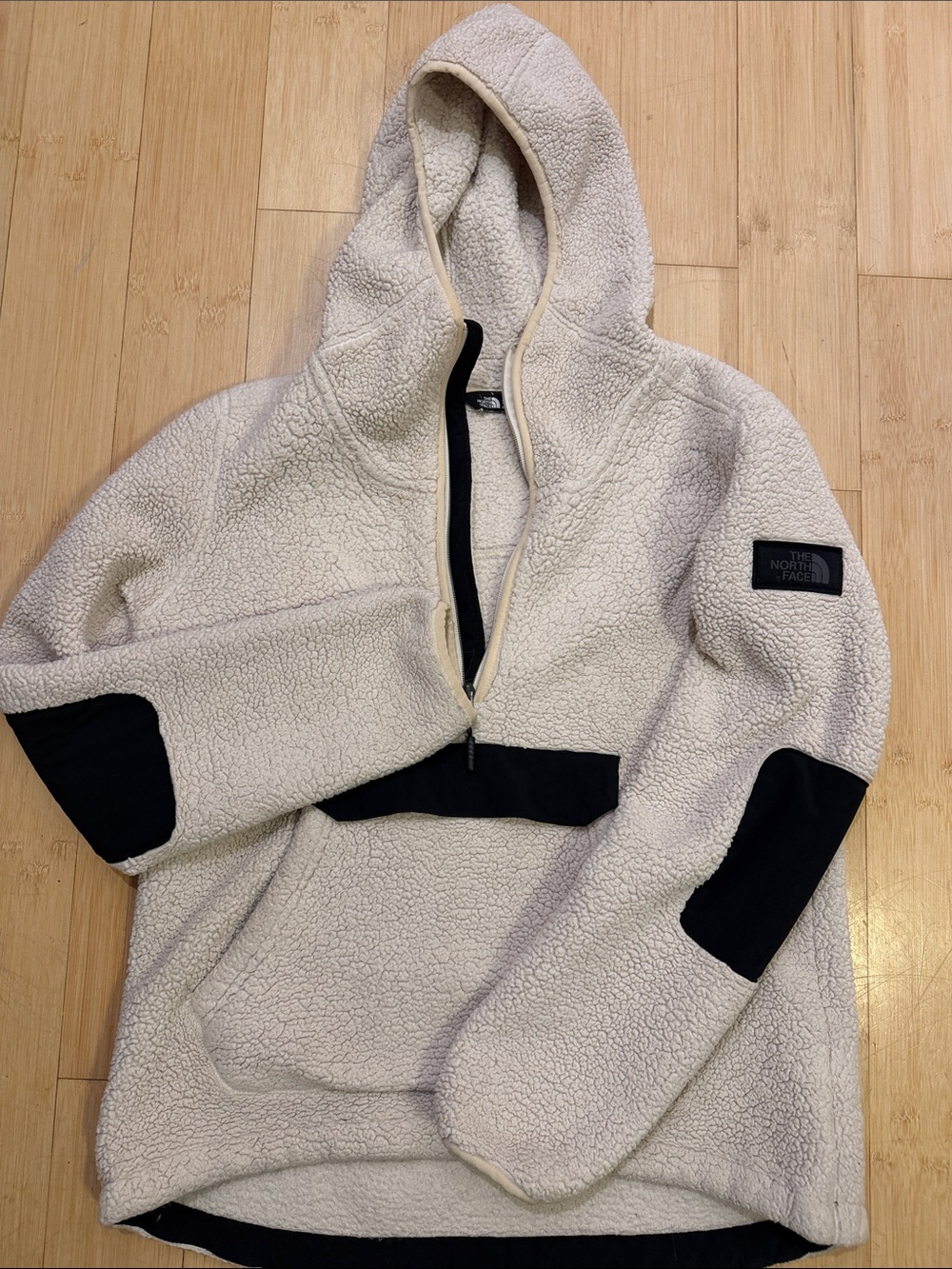 The North Face Cream Sherpa Half-Zip Hoodie with Black Trim